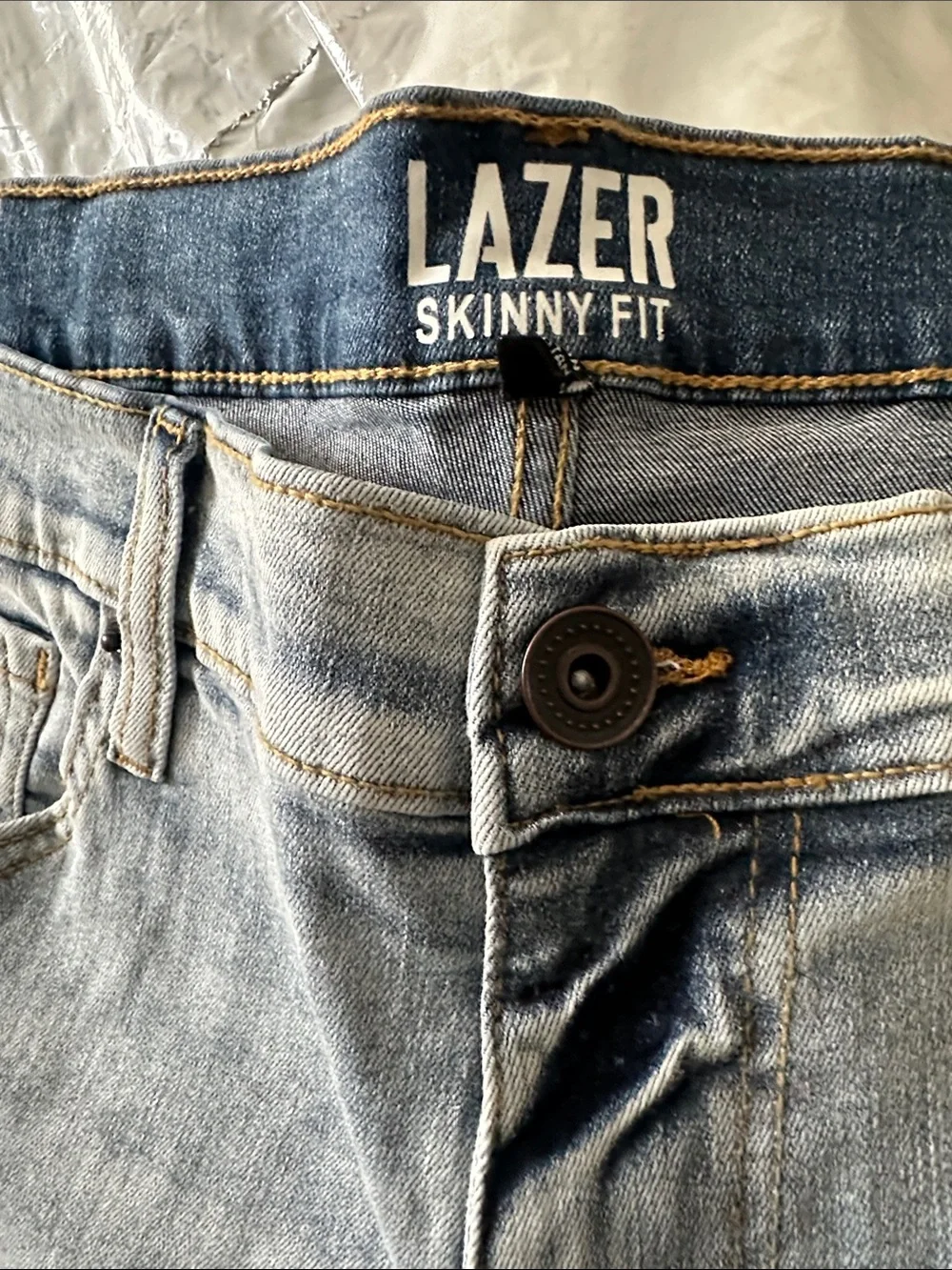 LAZER Men’s Light Blue Skinny Jeans with Distressed Details